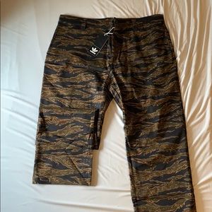 Adidas tiger camo chino pants.